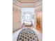 Elegant main bathroom features a freestanding tub under a decorative window at 750 Old Loganville Road Southwest, Loganville, GA 30052