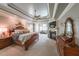 Spacious main bedroom features a fireplace, sitting area, and tray ceilings at 750 Old Loganville Road Southwest, Loganville, GA 30052
