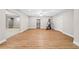 Finished basement with wood floors, neutral walls, recessed lighting, ceiling fan, and workout equipment at 217 Heritage Town Pkwy, Canton, GA 30115