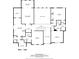 Detailed floor plan showcasing layout of bedrooms, bathrooms, and open areas in a spacious home at 217 Heritage Town Pkwy, Canton, GA 30115