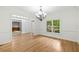 Bright living room with hardwood floors and large windows offering ample light at 217 Heritage Town Pkwy, Canton, GA 30115