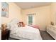 Comfortable bedroom with a plush bed, soft linens, and a decorative dresser at 3302 Bellingham Way, Lithia Springs, GA 30122