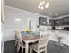 Cozy dining area adjacent to kitchen, complete with a wooden table and chairs at 3302 Bellingham Way, Lithia Springs, GA 30122