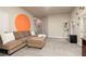 Contemporary living room showcasing a large decorative circle, cozy sofa, and modern artwork at 3302 Bellingham Way, Lithia Springs, GA 30122