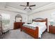 Spacious bedroom with trey ceiling, cozy carpet, and complementary furnishings at 3302 Bellingham Way, Lithia Springs, GA 30122