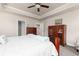 Spacious bedroom with trey ceiling, cozy carpet, and complementary furnishings at 3302 Bellingham Way, Lithia Springs, GA 30122