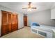 Comfortable bedroom featuring ceiling fan, closet, and natural light at 133 Sw Patterson Rd, Lawrenceville, GA 30044