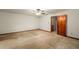 Bedroom featuring carpet floors, fan and closet at 133 Sw Patterson Rd, Lawrenceville, GA 30044