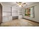 Bright bedroom features built-in shelving and storage with a large window at 133 Sw Patterson Rd, Lawrenceville, GA 30044