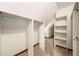 Walk-in closet with custom shelving and ample storage space at 133 Sw Patterson Rd, Lawrenceville, GA 30044