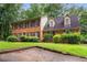 A two-story brick home, front lawn, and driveway at 133 Sw Patterson Rd, Lawrenceville, GA 30044