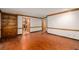 Spacious living room with hardwood floors, built-in bookshelves and natural lighting at 133 Sw Patterson Rd, Lawrenceville, GA 30044