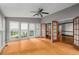 Sunroom with lots of natural light, multiple windows, fan, and french doors at 133 Sw Patterson Rd, Lawrenceville, GA 30044