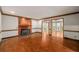 Spacious living room with fireplace and hardwood floors at 133 Sw Patterson Rd, Lawrenceville, GA 30044