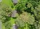 Overhead image of the property showcasing its private setting with mature trees and a lush green lawn at 1991 Flat Shoals Rd, Riverdale, GA 30296