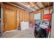 This unfinished basement has concrete floors and exposed wooden beams at 1991 Flat Shoals Rd, Riverdale, GA 30296