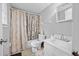 This full bathroom has a shower and tub combination and a single sink at 1991 Flat Shoals Rd, Riverdale, GA 30296