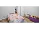 Bedroom featuring a twin bed, carpeted flooring, and gray paint at 1991 Flat Shoals Rd, Riverdale, GA 30296
