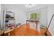 Bedroom with wood floors and a window at 1991 Flat Shoals Rd, Riverdale, GA 30296