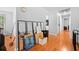 Hallway features hardwood floors and access to other rooms and spaces at 1991 Flat Shoals Rd, Riverdale, GA 30296