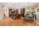 Open kitchen featuring a large center island, barstool seating, modern appliances and a breakfast nook at 3698 Lakeview Drive, Tucker, GA 30084