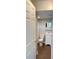 This bathroom features a toilet, vanity, and a mirror, creating a functional space at 6197 Union Grove Rd, Lithia Springs, GA 30122