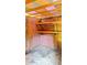 The shed interior has exposed studs and some unfinished brickwork at 6197 Union Grove Rd, Lithia Springs, GA 30122