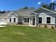 Charming single-story home with manicured lawn and traditional architectural details at 3708 Cheswolde Ave # 95, Powder Springs, GA 30127