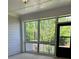 Relaxing screened porch offering beautiful views of the lush backyard and privacy at 3708 Cheswolde Ave # 95, Powder Springs, GA 30127