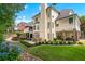 Lush backyard featuring a patio area, manicured landscaping, and a tranquil atmosphere at 5833 Wembley Dr, Douglasville, GA 30135