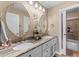 Elegant bathroom with double vanity, granite countertop and tile flooring at 5833 Wembley Dr, Douglasville, GA 30135