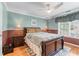 Well-lit bedroom featuring a comfortable bed, and a large window at 5833 Wembley Dr, Douglasville, GA 30135
