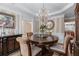 Elegant dining room features sophisticated chandelier and furniture at 5833 Wembley Dr, Douglasville, GA 30135
