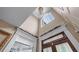 Elegant foyer with soaring ceilings and decorative trim at 5833 Wembley Dr, Douglasville, GA 30135