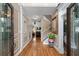 Inviting foyer with hardwood floors and detailed moldings leads to living areas at 5833 Wembley Dr, Douglasville, GA 30135