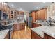 Well-equipped kitchen with granite countertops, stainless steel appliances, and custom cabinetry at 5833 Wembley Dr, Douglasville, GA 30135