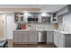 Well-equipped kitchen with stainless steel appliances, countertops, and grey cabinets at 5833 Wembley Dr, Douglasville, GA 30135