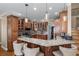 Gourmet kitchen featuring granite countertops, custom cabinetry, and stainless steel appliances at 5833 Wembley Dr, Douglasville, GA 30135