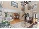 Open living space with soaring ceilings connecting kitchen and dining area at 5833 Wembley Dr, Douglasville, GA 30135