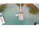 Aerial view of a boat dock on clear water with other docks visible at 6381 Lakeview Dr, Buford, GA 30518