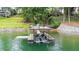 Modern boat dock with a lift on a serene lake at 6381 Lakeview Dr, Buford, GA 30518