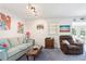 Cozy living room with comfortable seating and natural light at 6381 Lakeview Dr, Buford, GA 30518