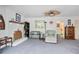 Bright living room with a white fireplace and comfortable seating at 6381 Lakeview Dr, Buford, GA 30518