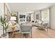 Inviting living room with fireplace, hardwood floors, comfortable seating, and ample natural light at 8501 Polston Place Lot 143 Pl, Douglasville, GA 30134