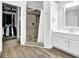 Bathroom featuring a walk-in shower, walk-in closet, and vanity with sink at 2330 Wood Creek Ct, Dacula, GA 30019