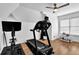 Bonus room with exercise equipment and plenty of space for activities at 2330 Wood Creek Ct, Dacula, GA 30019