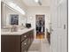 Spacious bathroom with vanity, walk-in closet, and natural light at 3978 Devonshire Dr, Marietta, GA 30066