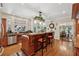 Charming kitchen with breakfast bar, sink with a view, stainless appliances, and wooden cabinetry at 3978 Devonshire Dr, Marietta, GA 30066