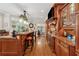Gourmet kitchen with custom cabinetry, granite countertops, and breakfast bar seating at 3978 Devonshire Dr, Marietta, GA 30066
