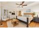 Comfortable main bedroom featuring trey ceilings, a ceiling fan, and lots of natural light at 3978 Devonshire Dr, Marietta, GA 30066